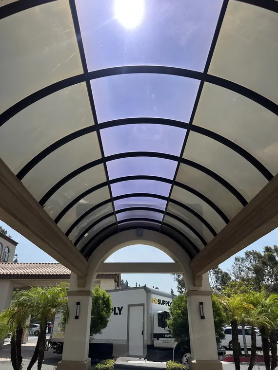 Curved entrance canopy viewed from below