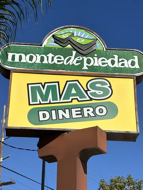 Monte de Piedad pole sign in daylight