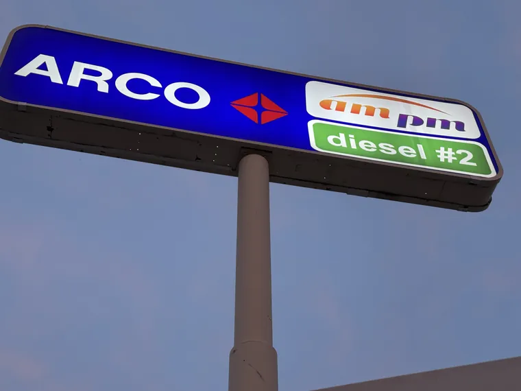ARCO and ampm illuminated pole sign