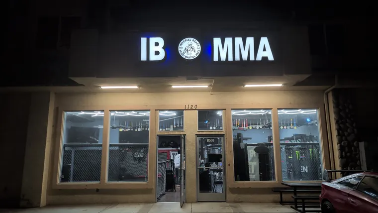 IB MMA illuminated sign above the entrance
