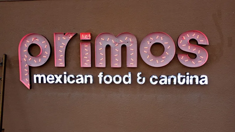Primos Mexican Food channel letters with the faces off, showing the LEDs inside