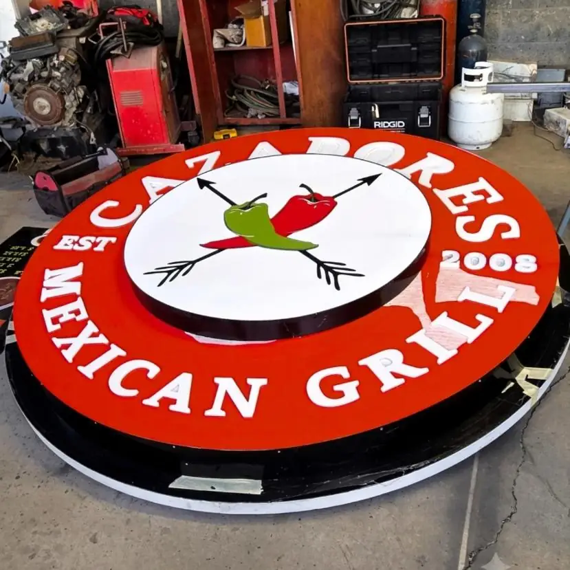 Cazadores Mexican Grill round logo cabinet finished on the shop floor