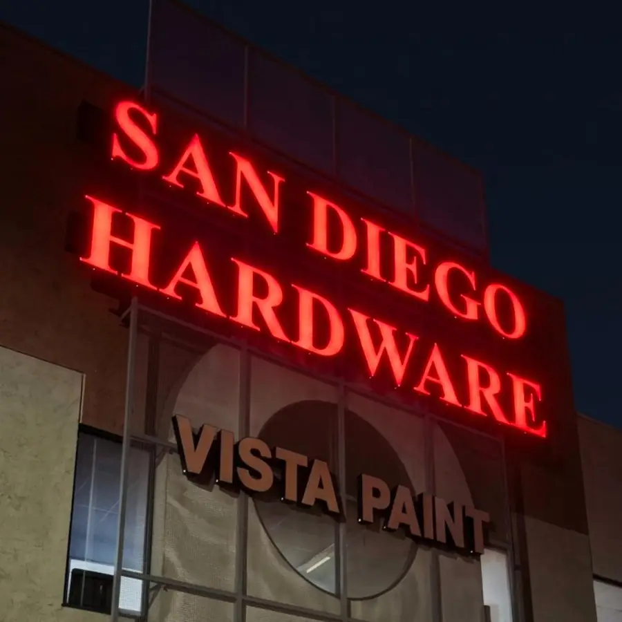 San Diego Hardware and Vista Paint channel letters lit red at night