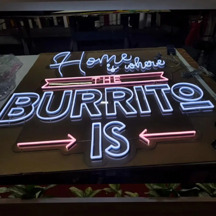 Home is Where the Burrito Is neon sign finished on the shop bench