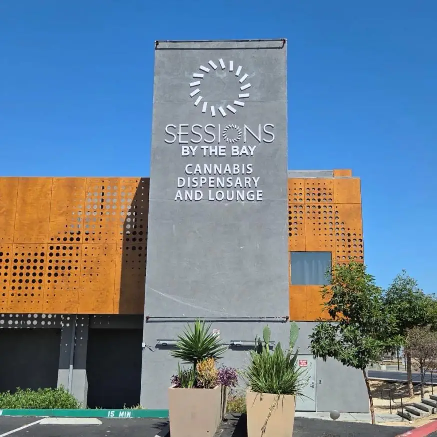 Sessions by the Bay building signage seen from the parking lot