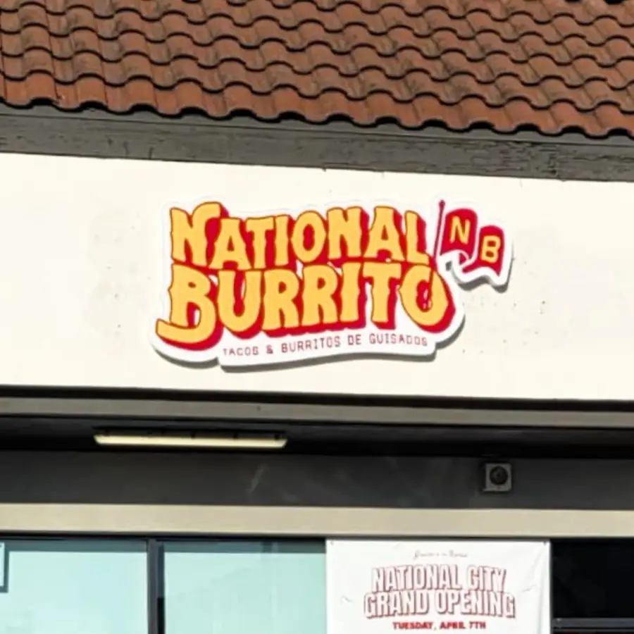 National Burrito dimensional logo sign above a storefront entrance