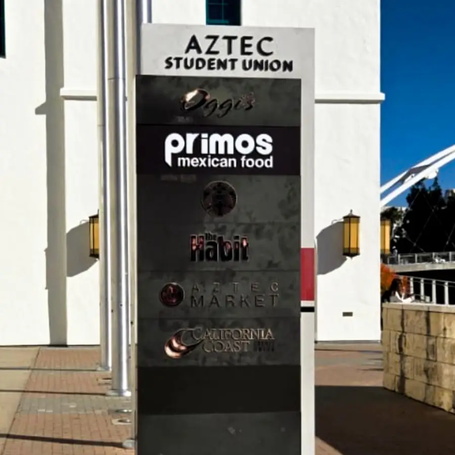 Aztec Student Union monument sign listing Primos, Starbucks and The Habit