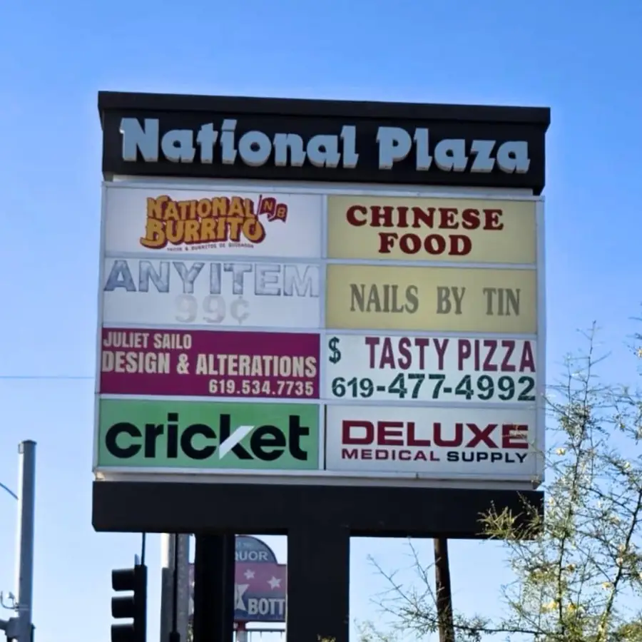 National Plaza multi-tenant pylon sign with backlit tenant panels