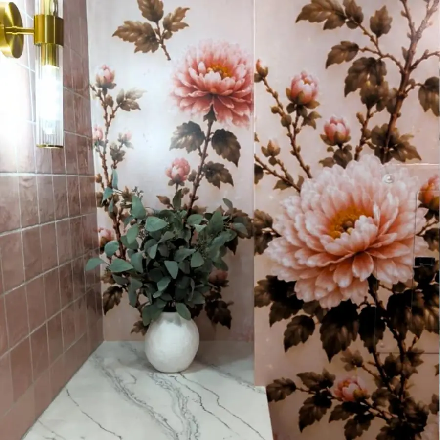 Finished floral wall covering with marble tile and a plant