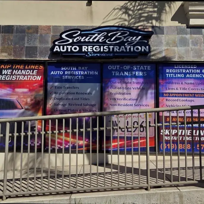 Finished South Bay Auto Registration window graphics seen from the street