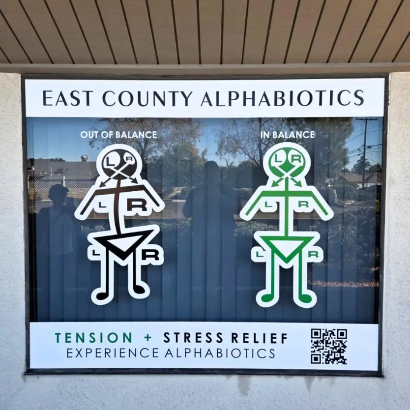 East County Alphabiotics window graphic seen from the sidewalk